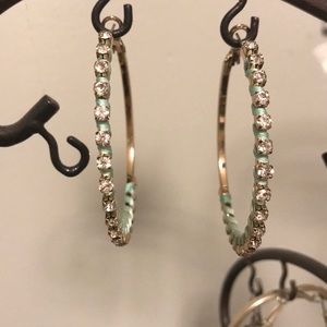 New Mark by Avon fashion ribbon and cz’s stone hoops
